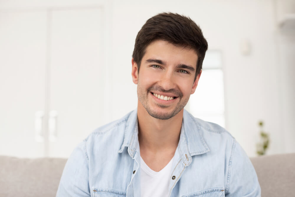 how to fix overlapping front teeth without braces